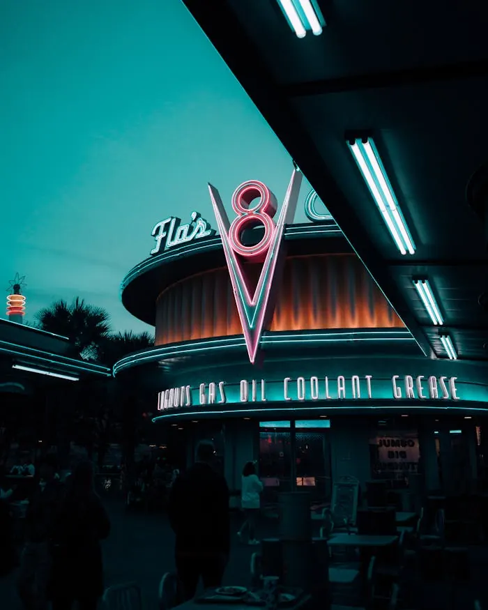 Chrome and neon detailing inside a retro-styled bar interior